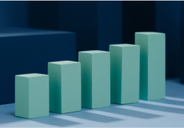 3D bar chart composed of five light blue rectangular blocks arranged in ascending order against a dark blue background.